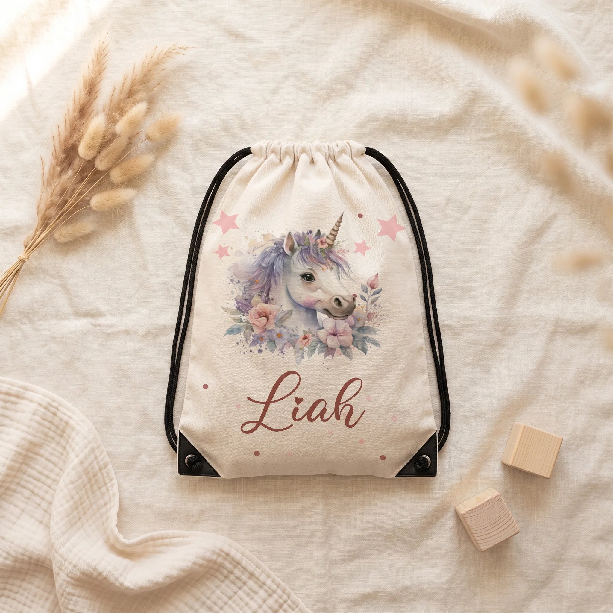 Personalisierter Turnbeutel Einhorn mit Blumen, naturfarbener Sportbeutel mit Wunschname und schwarzer Kordel