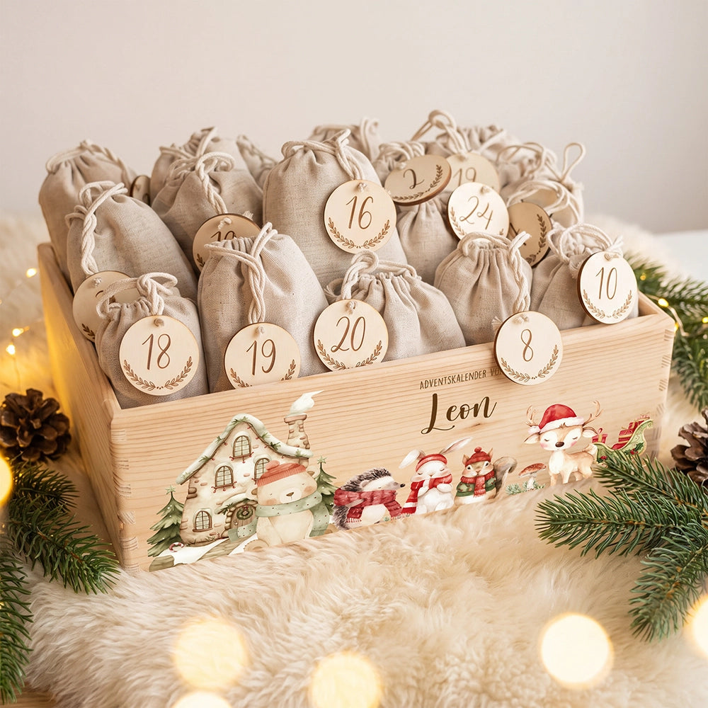 Adventskalender zum BefĂĽllen "Winterdorf mit Tieren" personalisiert