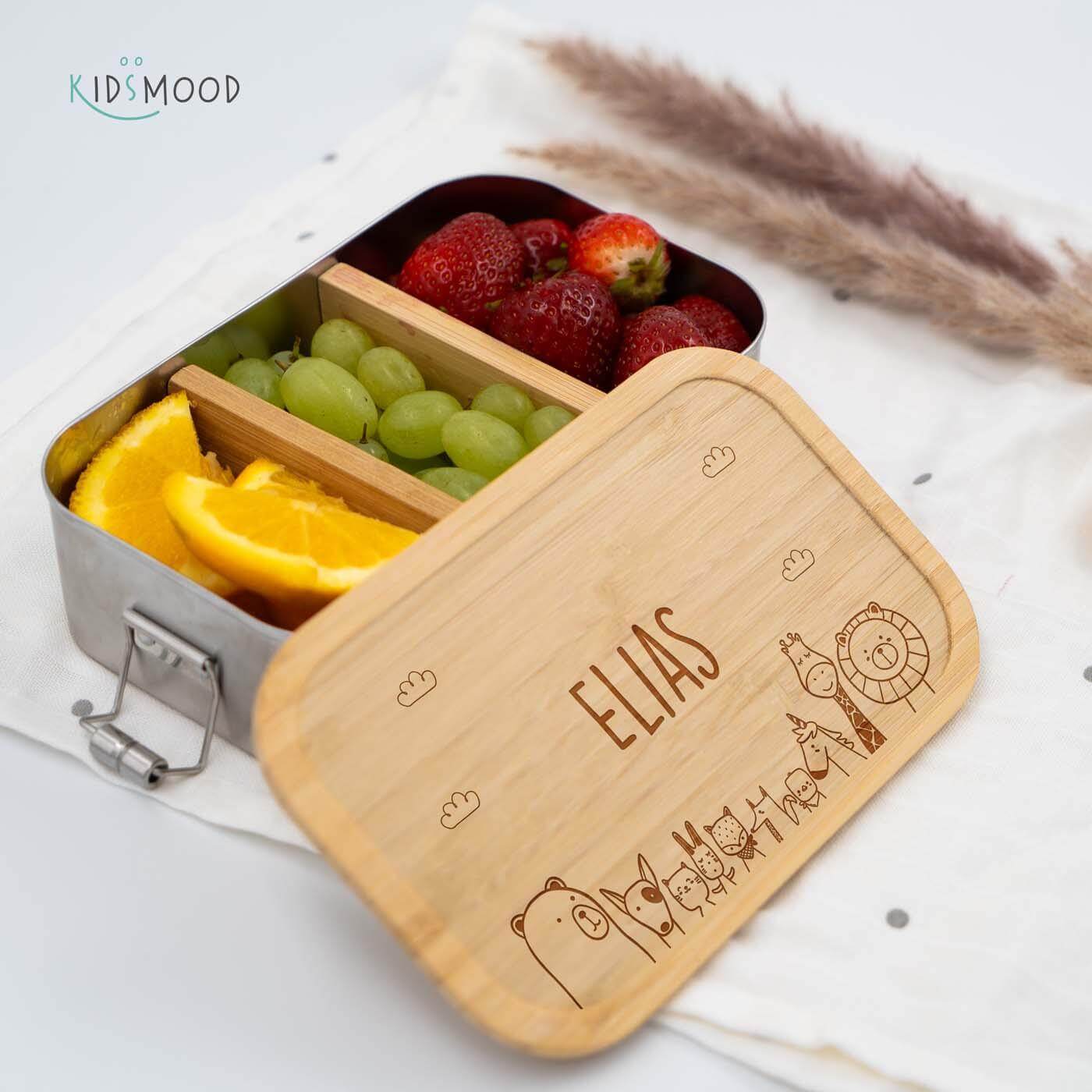 close-up of lunchbox with animal family motif